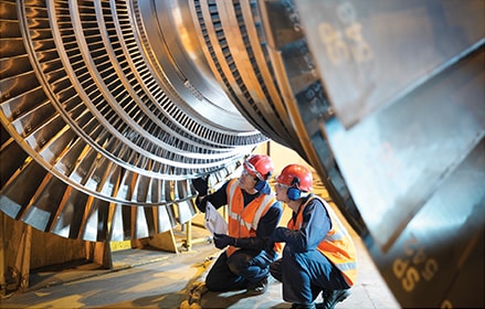 Engineers working on turbine