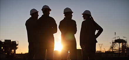 Industrial workers in a group setting