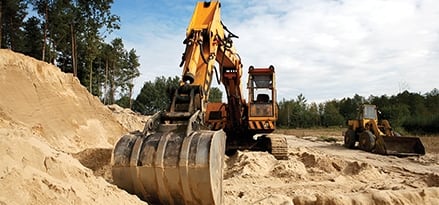 Yellow excavator construction